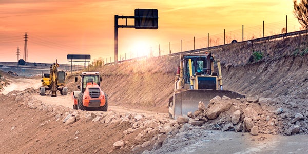 bulldozer moving rocks